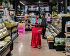 US economy grows faster than expected but inflation rises to 3.7%